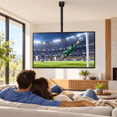 Couple on a sofa watching football on a TV hanging from a black ceiling mount pole in a bright lounge room
