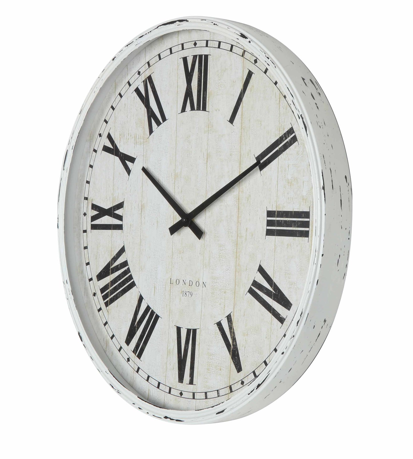 Antique white wall clock styled in a room