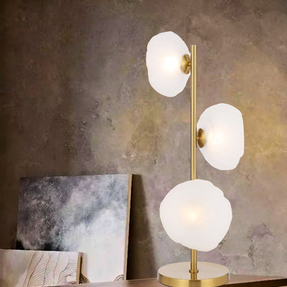 Elegant three-light table lamp with antique gold frame and frost glass