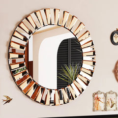 Silver and tawny round sunburst mirror with beveled glass