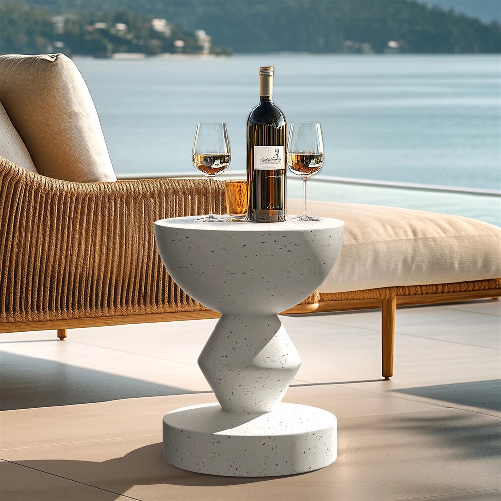 Sculptural white concrete side table for indoor spaces