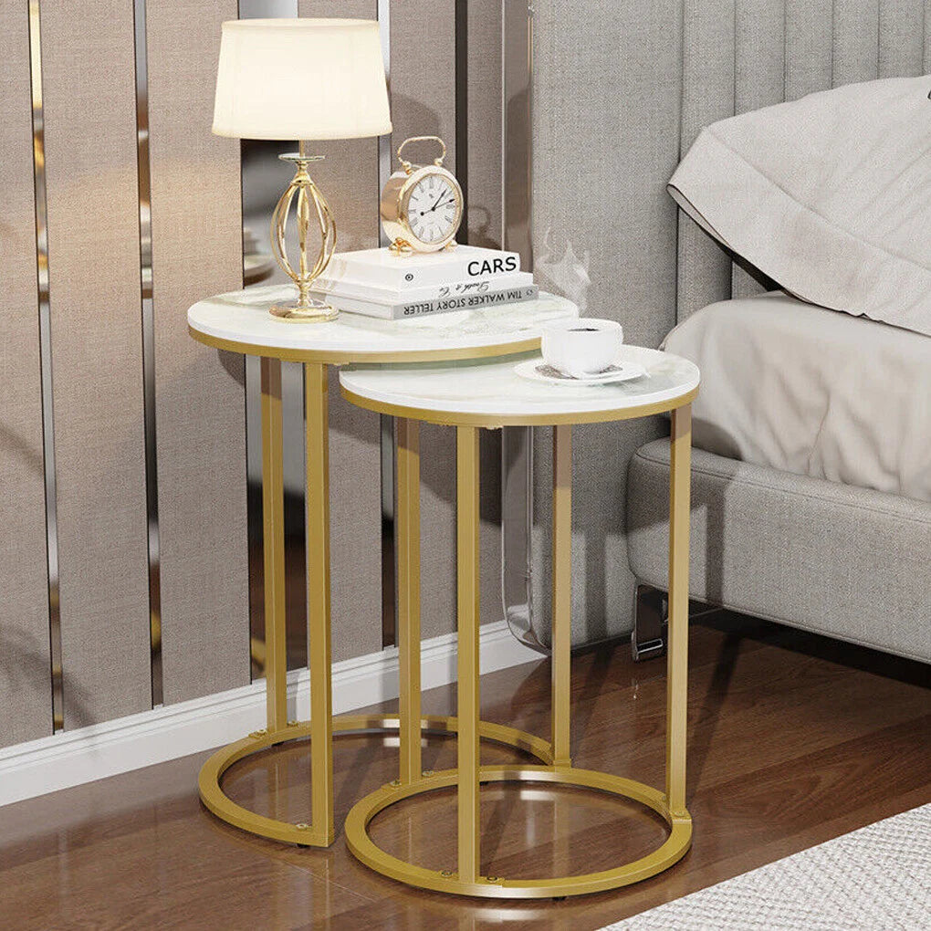 Modern white nesting side tables with elegant gold metal frames