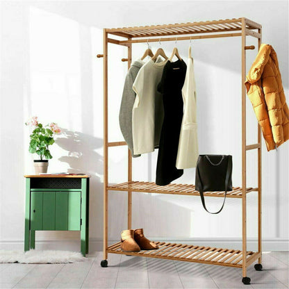 Bamboo clothes rack styled with garments and accessories