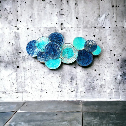 Modern ocean-inspired metal wall decoration in blue and aqua