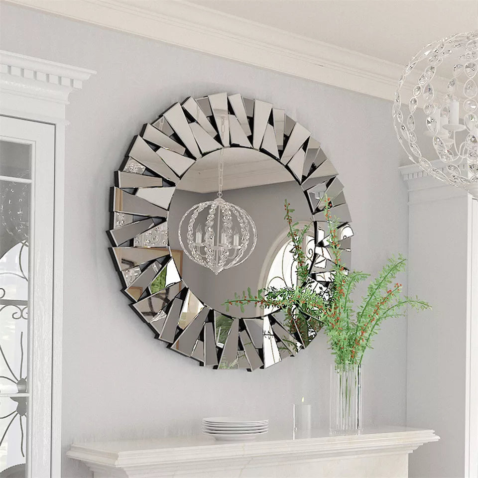 Round sunburst mirror reflecting room light