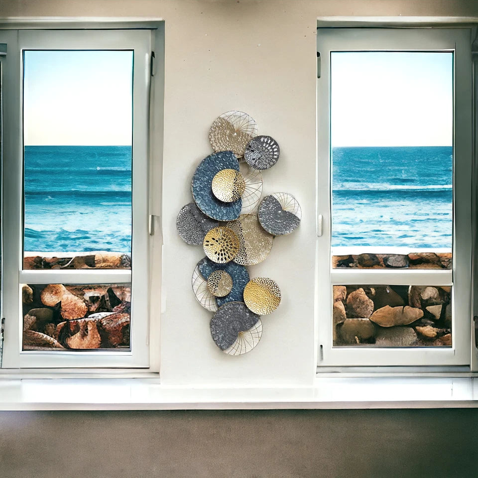 Abstract metal wall décor with layered metallic finish