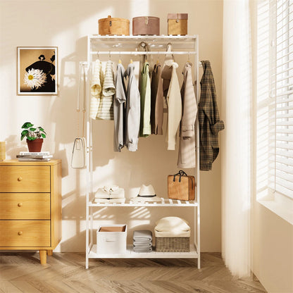 Freestanding bamboo clothing rack with multiple hooks